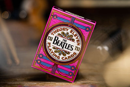 The Beatles som spiller kort rosa versjon