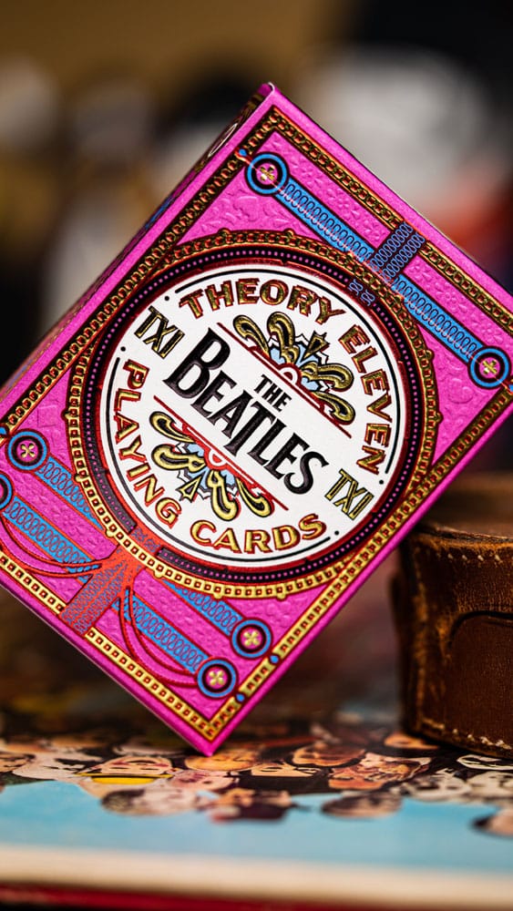 The Beatles som spiller kort rosa versjon